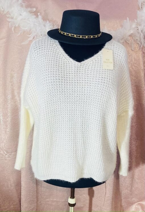 Pull doux brillant manches chaussettes